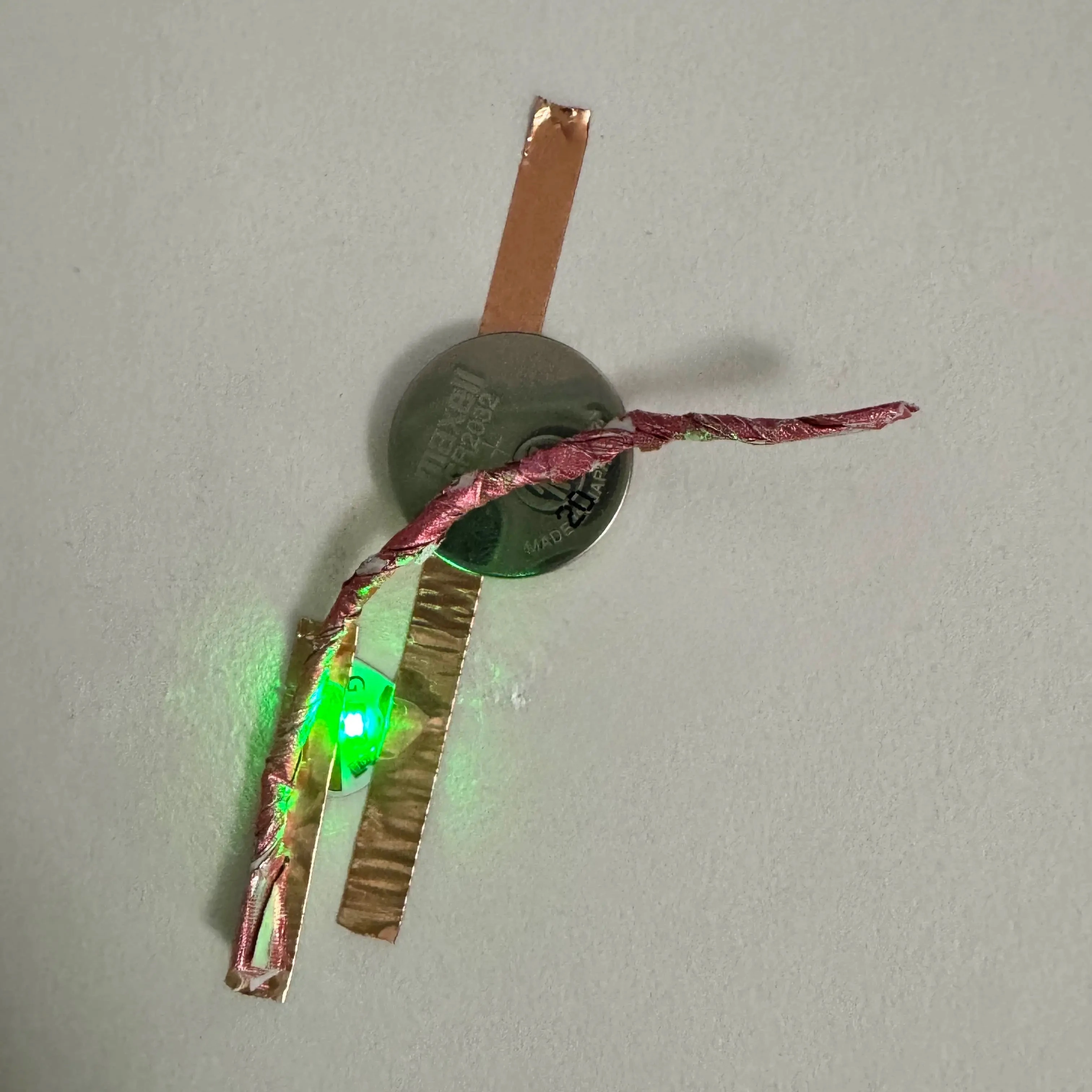 During the last two attempts, I painstakingly separated the foil from the paper and I finally realized that I could just twist it and it would work the same way. It's so much sturdier this way, whereas the foil by itself was quite fragile.